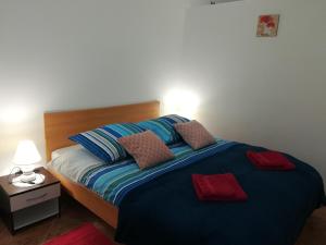 Posteľ alebo postele v izbe v ubytovaní Apartment MIS Floura