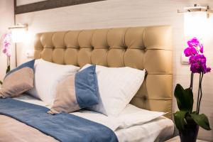 Postel nebo postele na pokoji v ubytování ANTARES Apart hotel