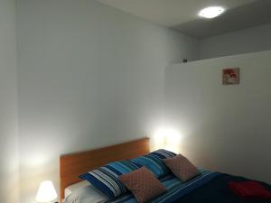 Posteľ alebo postele v izbe v ubytovaní Apartment MIS Floura