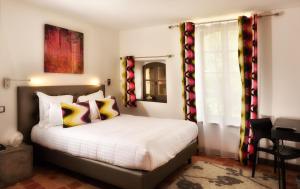 Ένα ή περισσότερα κρεβάτια σε δωμάτιο στο La Ferme Chapouton - Teritoria