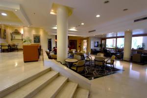 Posezení v ubytování Ambassador Hotel