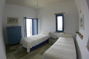 Postel nebo postele na pokoji v ubytování Bioclimatic stone built villa