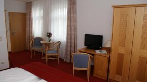TV a/nebo společenská místnost v ubytování Hotel Waldperle