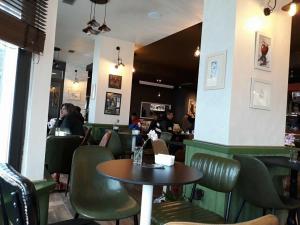 Area soggiorno di Hotel The First