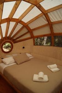 Katil atau katil-katil dalam bilik di Biosfera Lodge