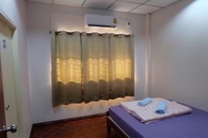 Postel nebo postele na pokoji v ubytování JD hostel
