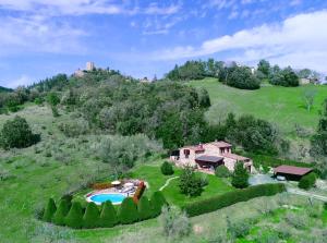 Fotografia z galérie ubytovania Villa esclusiva in Toscana con piscina privata v destinácii Montecastelli