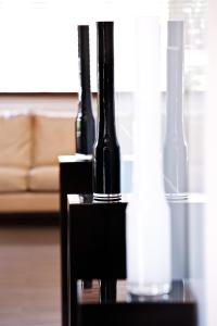 a group of wine bottles sitting on a table at Hotel Carla in Levanto