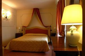 Posteľ alebo postele v izbe v ubytovaní Palazzo Loup Hotel