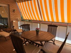 Posedenie v ubytovaní Apartamentos Llobregat