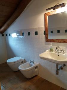 Koupelna v ubytování B&B Il Melograno + 37 fotografií