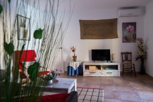 TV a/nebo společenská místnost v ubytování La Casa De Las Abuelas