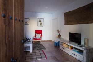 TV a/nebo společenská místnost v ubytování La Casa De Las Abuelas