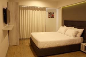 Posteľ alebo postele v izbe v ubytovaní Awqa Hoteles - Sede Natasha