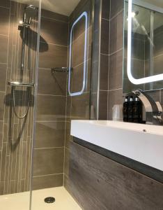 A bathroom at Treveighan Farmhouse