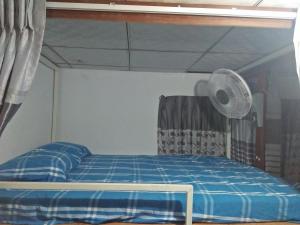 Letto o letti in una camera di Kingfisher Hostel