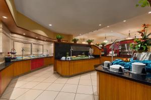 a kitchen filled with lots of counter top space at Buena Vista Suites Orlando in Orlando