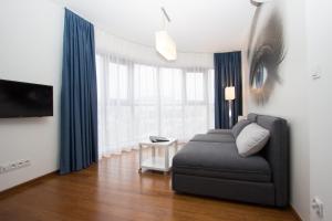 Et tv og/eller underholdning på Lenzo Apartments