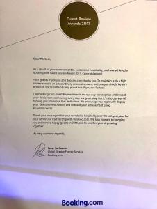 Certifikat, nagrada, znak ali drug dokument, ki je prikazan v nastanitvi Hotel Khangri