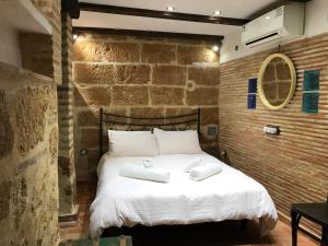 Postel nebo postele na pokoji v ubytování No1 CasaTosca Javea, Pequeña Habitación con baño en el Centro del Casco Antiguo