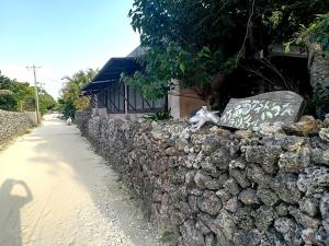 Зображення з фотогалереї помешкання Taketomijima Guesthouse and je Taime у місті Такетомі
