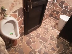 Ванна кімната в Taketomijima Guesthouse and je Taime