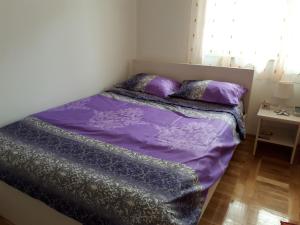 Postel nebo postele na pokoji v ubytování Apartman Ana