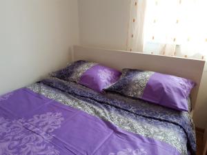 Postel nebo postele na pokoji v ubytování Apartman Ana