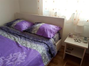 Postel nebo postele na pokoji v ubytování Apartman Ana