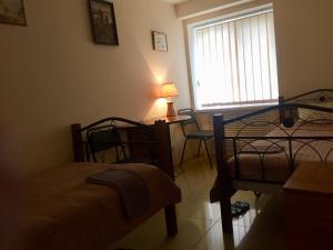 Postel nebo postele na pokoji v ubytování Westend hostel Kyiv
