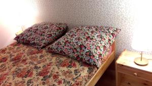Łóżko lub łóżka w pokoju w obiekcie 66 Szyszek