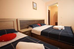 Postel nebo postele na pokoji v ubytování GALA Hotel Ureki