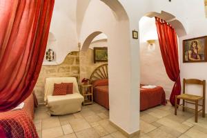 Postel nebo postele na pokoji v ubytování B&B Borgo San Martino