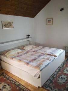Postel nebo postele na pokoji v ubytování Apartmani Marijana