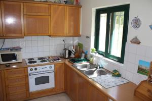 Kuchyň nebo kuchyňský kout v ubytování Pasha Bay Residence
