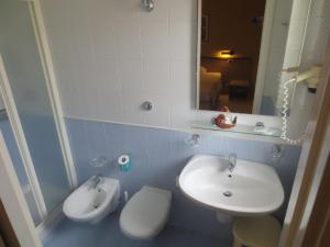Koupelna v ubytování Hotel Armando' s