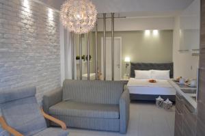 Łóżko lub łóżka w pokoju w obiekcie Aqua Luxury Villas