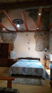 Postel nebo postele na pokoji v ubytování Il Borgo dei Laghi