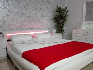 Letto o letti in una camera di Mecenate Cozy Flat