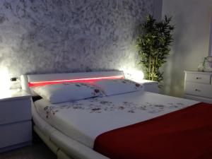 Letto o letti in una camera di Mecenate Cozy Flat