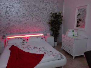 Letto o letti in una camera di Mecenate Cozy Flat