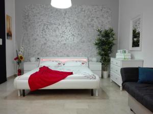 Letto o letti in una camera di Mecenate Cozy Flat