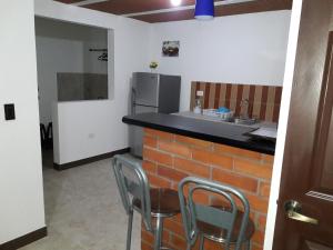 Nhà bếp/bếp nhỏ tại Hostal Balcones de la Piedra