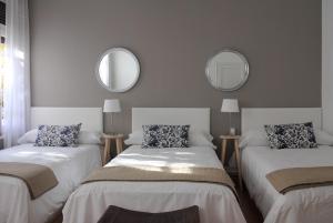 Postel nebo postele na pokoji v ubytování 7 Moons B&B