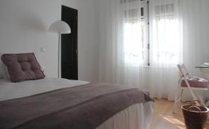 Postel nebo postele na pokoji v ubytování 7 Moons B&B