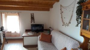 TV a/nebo společenská místnost v ubytování Casa a picco sul mare 5 terre