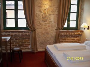 Postel nebo postele na pokoji v ubytování Hotel Carpymore