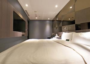 Ліжко або ліжка в номері Beauty Hotels Taipei - B7 Journey