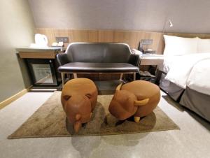 Ліжко або ліжка в номері Beauty Hotels Taipei - B7 Journey