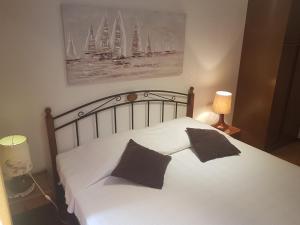 Postel nebo postele na pokoji v ubytování Apartman Nadia